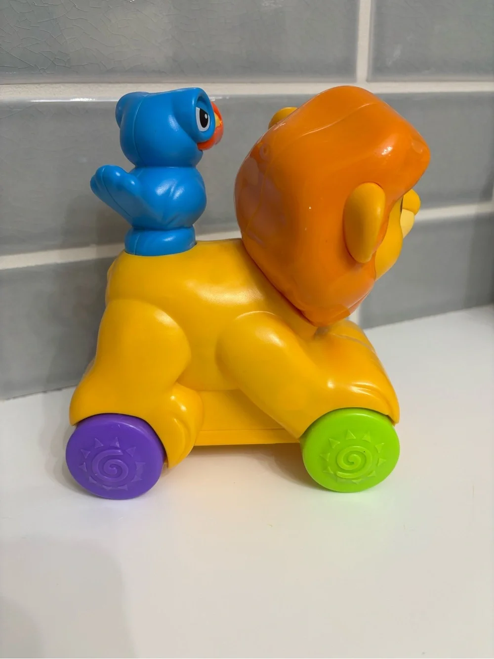 Fisher-Price Disney Baby Rollin' Tunes Mufasa push-along toy